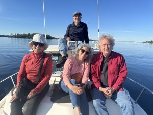 Four happy customers sightseeing with 1000 Islands Water Tours